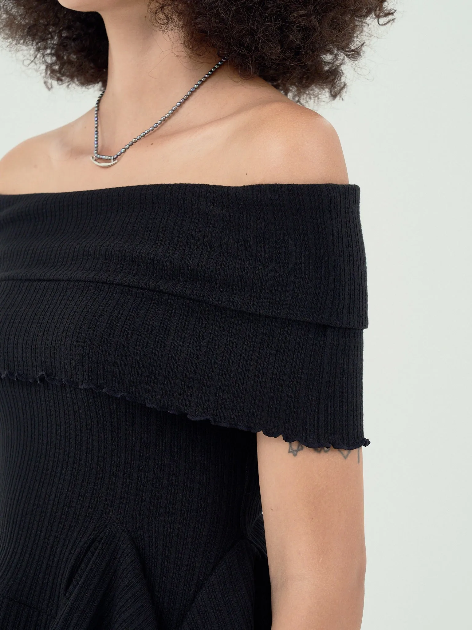 GOEN.J  Off-the-shoulder ruffle-trim ribbed cotton top - Black