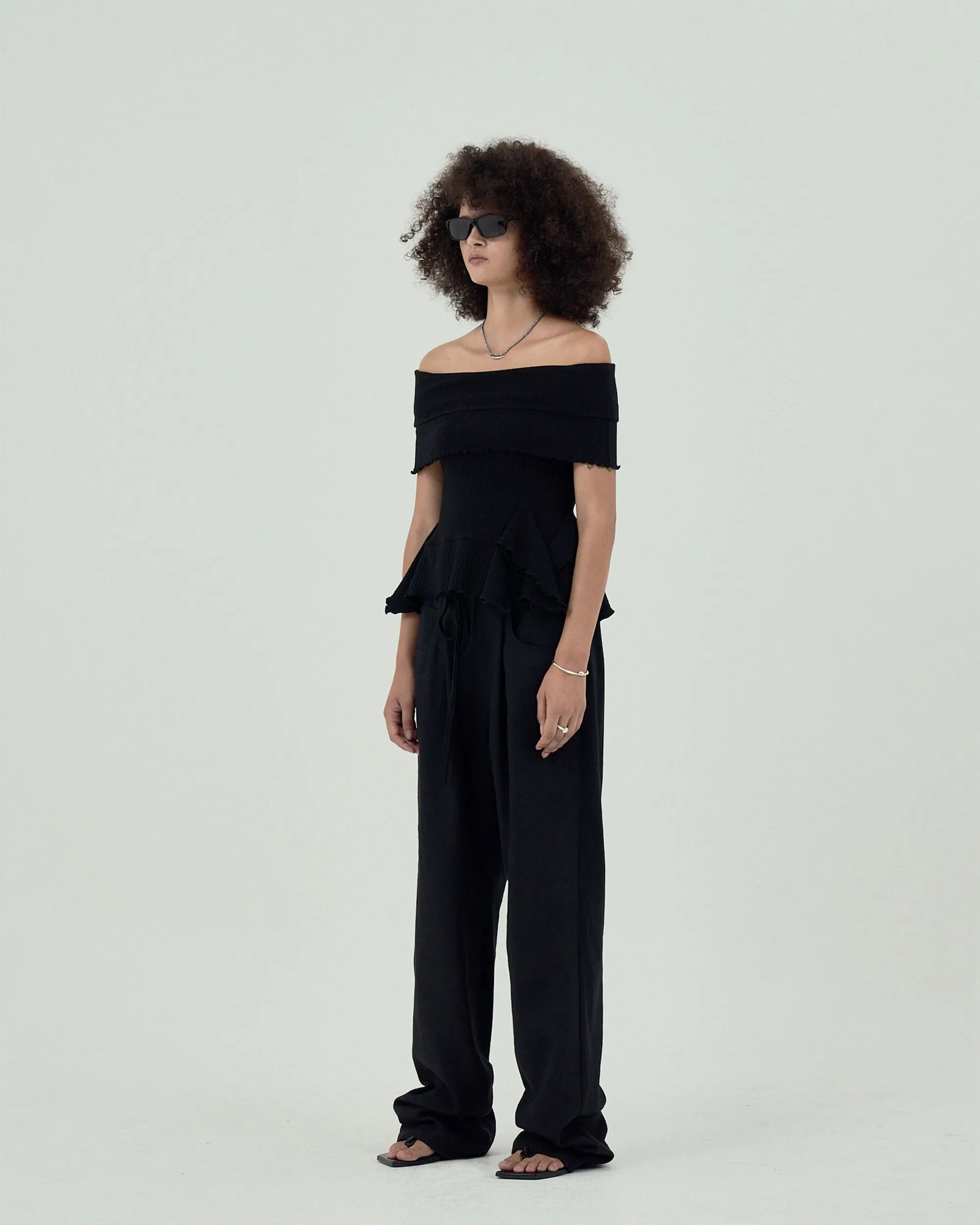 GOEN.J  Off-the-shoulder ruffle-trim ribbed cotton top - Black