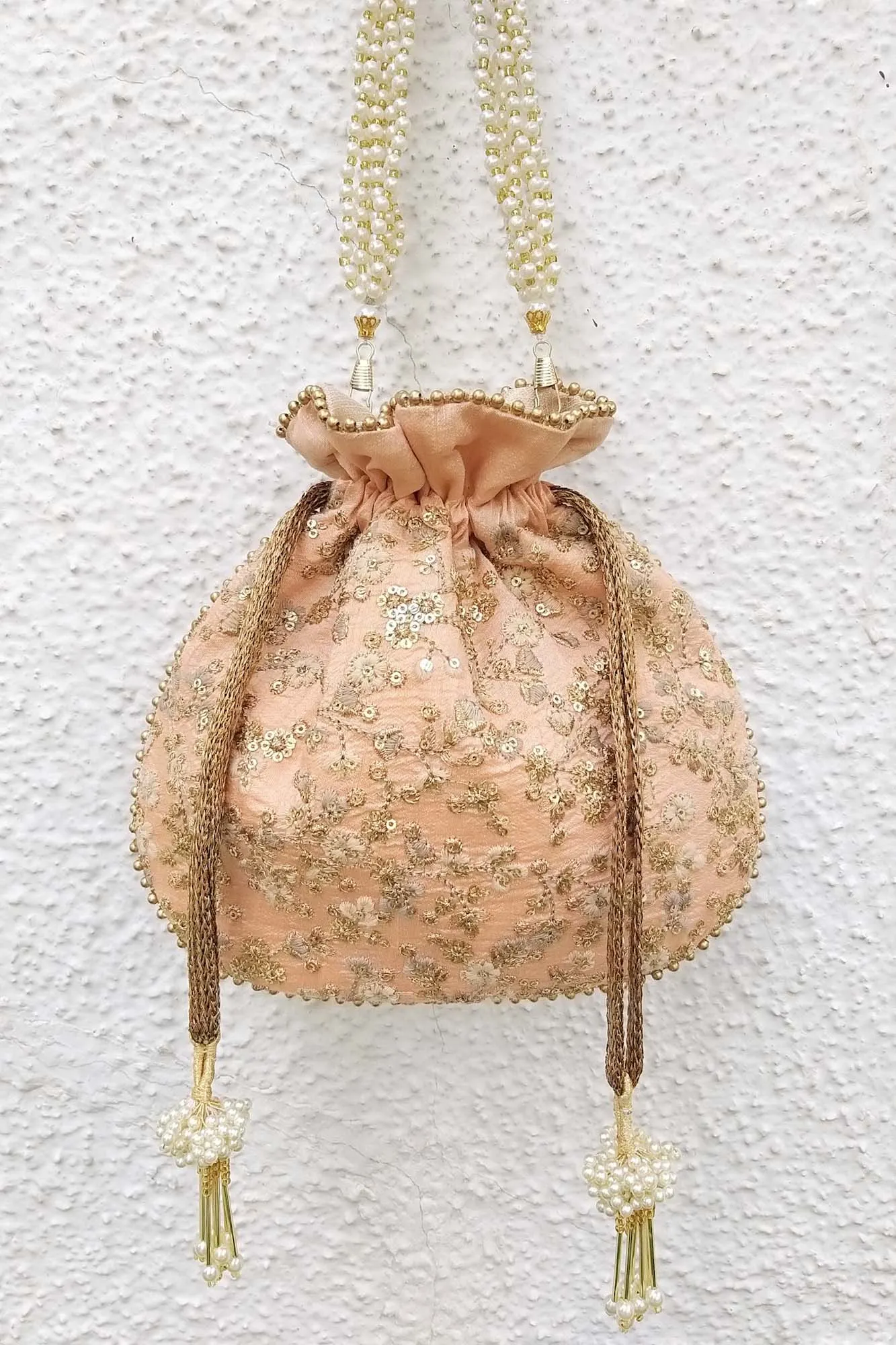 Peach floral embroidered potli bag